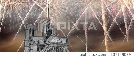 Celebratory fireworks over the Notre Dame de Paris, also known as Notre Dame Cathedral or simply Notre Dame, is a Gothic, Roman Catholic cathedral of Paris, France Celebratory fireworks over the Notre Dame de Paris, also known as Notre Dame Cathedral or simply Notre Dame, is a Gothic, Roman Catholic cathedral of Paris, France 107149029