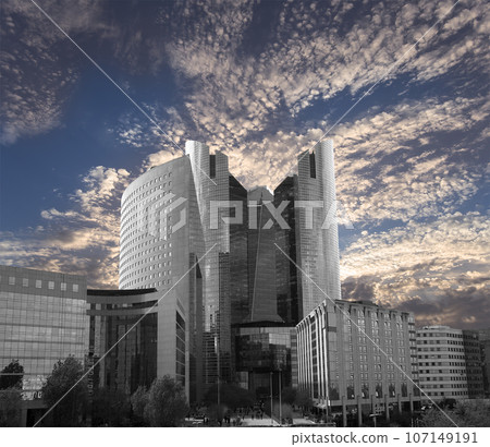 Skyscrapers La Defense (against the background of a sky at sunset), commercial and business center of Paris, France Skyscrapers La Defense (against the background of a sky at sunset), commercial and business center of Paris, France 107149191