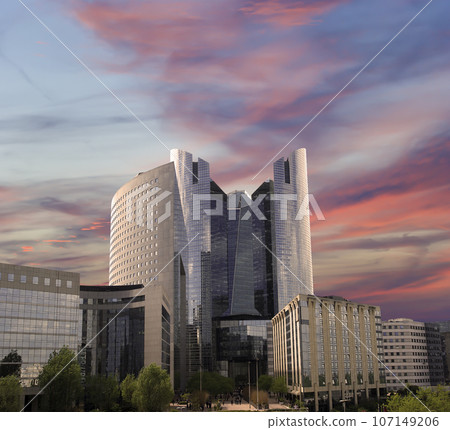 Skyscrapers La Defense (against the background of a sky at sunset), commercial and business center of Paris, France Skyscrapers La Defense (against the background of a sky at sunset), commercial and business center of Paris, France 107149206