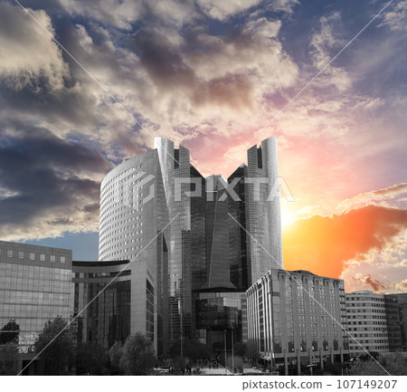 Skyscrapers La Defense (against the background of a sky at sunset), commercial and business center of Paris, France 107149207