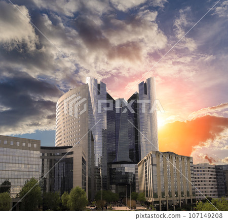 Skyscrapers La Defense (against the background of a sky at sunset), commercial and business center of Paris, France 107149208