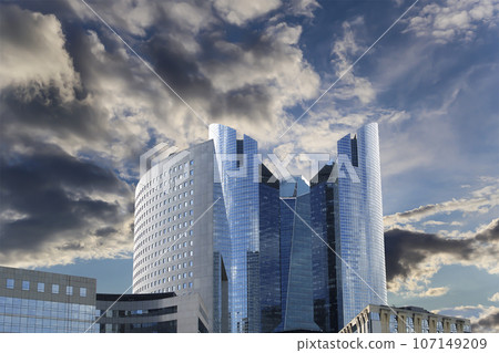 Skyscrapers La Defense (against the background of a sky at sunset), commercial and business center of Paris, France Skyscrapers La Defense (against the background of a sky at sunset), commercial and business center of Paris, France 107149209