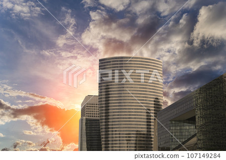 Skyscrapers La Defense (against the background of a sky at sunset), commercial and business center of Paris, France Skyscrapers La Defense (against the background of a sky at sunset), commercial and business center of Paris, France 107149284