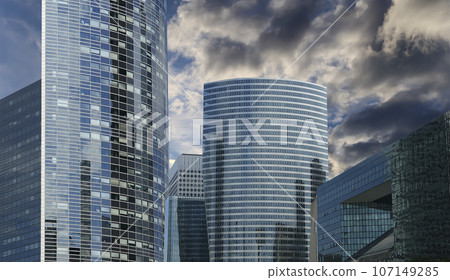 Skyscrapers La Defense (against the background of a sky at sunset), commercial and business center of Paris, France Skyscrapers La Defense (against the background of a sky at sunset), commercial and business center of Paris, France 107149285