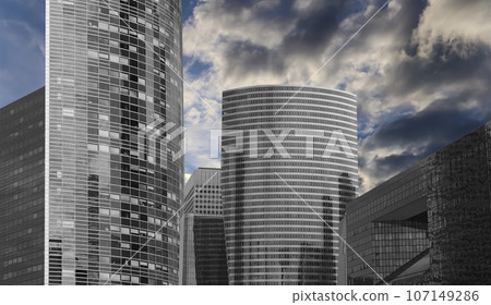 Skyscrapers La Defense (against the background of a sky at sunset), commercial and business center of Paris, France 107149286