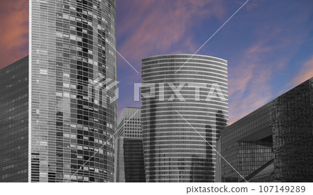 Skyscrapers La Defense (against the background of a sky at sunset), commercial and business center of Paris, France 107149289