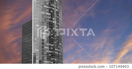 Skyscrapers La Defense (against the background of a sky at sunset), commercial and business center of Paris, France 107149403