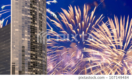 Celebratory fireworks over the Skyscrapers La Defense, commercial and business center of Paris, France Celebratory fireworks over the Skyscrapers La Defense, commercial and business center of Paris, France 107149484
