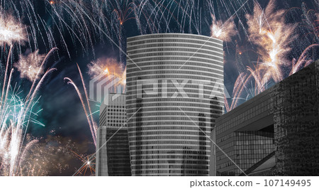 Celebratory fireworks over the Skyscrapers La Defense, commercial and business center of Paris, France Celebratory fireworks over the Skyscrapers La Defense, commercial and business center of Paris, France 107149495