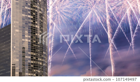 Celebratory fireworks over the Skyscrapers La Defense, commercial and business center of Paris, France Celebratory fireworks over the Skyscrapers La Defense, commercial and business center of Paris, France 107149497