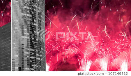 Celebratory fireworks over the Skyscrapers La Defense, commercial and business center of Paris, France Celebratory fireworks over the Skyscrapers La Defense, commercial and business center of Paris, France 107149512