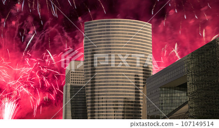 Celebratory fireworks over the Skyscrapers La Defense, commercial and business center of Paris, France Celebratory fireworks over the Skyscrapers La Defense, commercial and business center of Paris, France 107149514