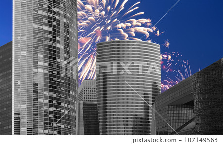 Celebratory fireworks over the Skyscrapers La Defense, commercial and business center of Paris, France 107149563