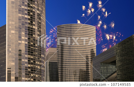 Celebratory fireworks over the Skyscrapers La Defense, commercial and business center of Paris, France Celebratory fireworks over the Skyscrapers La Defense, commercial and business center of Paris, France 107149585