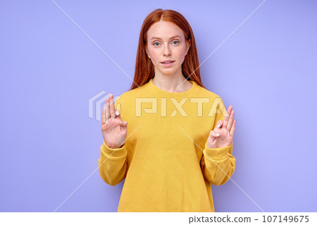 young good-looking ginger girl learning body language 107149675