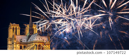 Celebratory fireworks over the Notre Dame de Paris, also known as Notre Dame Cathedral or simply Notre Dame, is a Gothic, Roman Catholic cathedral of Paris, France Celebratory fireworks over the Notre Dame de Paris, also known as Notre Dame Cathedral or simply Notre Dame, is a Gothic, Roman Catholic cathedral of Paris, France 107149722