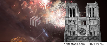 Celebratory fireworks over the Notre Dame de Paris, also known as Notre Dame Cathedral or simply Notre Dame, is a Gothic, Roman Catholic cathedral of Paris, France 107149762