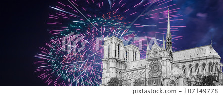 Celebratory fireworks over the Notre Dame de Paris, also known as Notre Dame Cathedral or simply Notre Dame, is a Gothic, Roman Catholic cathedral of Paris, France 107149778