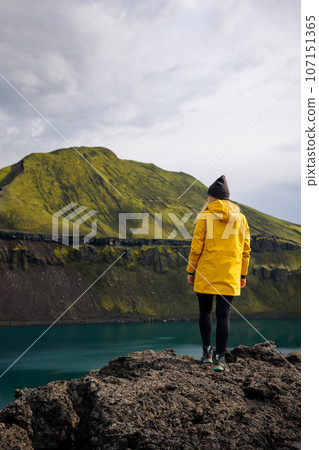 Backpacker girl in Iceland takes a moment to reflect Backpacker girl in Iceland takes a moment to reflect 107151365