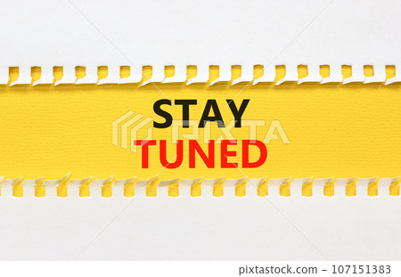 Stay tuned symbol. Concept words Stay tuned on beautiful yellow paper on beautiful white background. Business, support, motivation, psychological and stay tuned concept. Copy space. 107151383