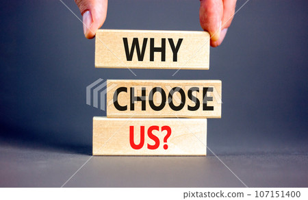 Why choose us symbol. Concept word Why choose us on beautiful wooden block. Businessman hand. Beautiful grey table grey background. Business motivational why choose us concept. Copy space. Why choose us symbol. Concept word Why choose us on beautiful wooden block. Businessman hand. Beautiful grey table grey background. Business motivational why choose us concept. Copy space. 107151400