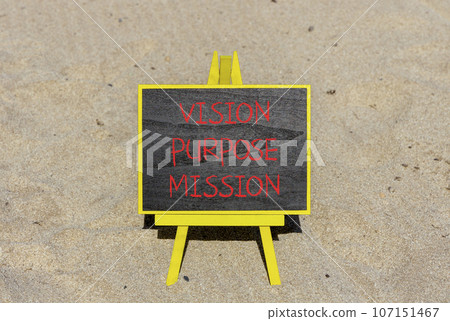 Vision purpose mission symbol. Concept word Vision Purpose Mission on beautiful black blackboard. Beautiful sand beach background. Business motivational vision purpose mission concept. Copy space. 107151467