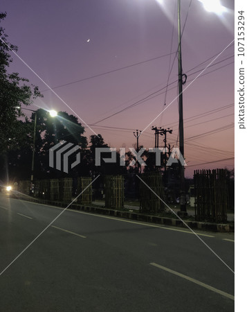 DRAMATIC SKY AND ROAD IN MORABADI, RANCHI, JHARKHAND, INDIA 107153294
