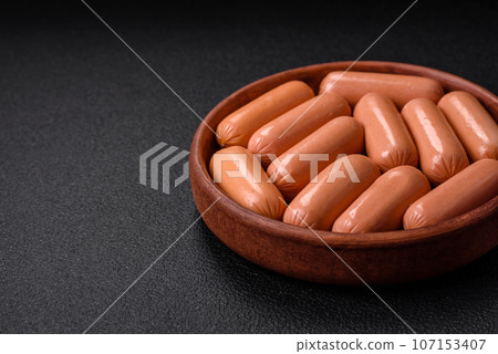 Delicious fresh vegetarian sausage or sausage made from vegetable protein tofu or seitan 107153407
