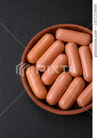 Delicious fresh vegetarian sausage or sausage made from vegetable protein tofu or seitan Delicious fresh vegetarian sausage or sausage made from vegetable protein tofu or seitan 107153409