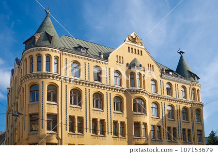 Latvian tourist landmark attraction - old retro cat house, Riga, Latvia. Latvian tourist landmark attraction - old retro cat house, Riga, Latvia. 107153679