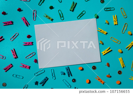 Empty white paper note frame border of school stationery supplies. Copy space for your text or Educational greeting announcement for students and teacher. Top view flat lay Creative vivid colorful 107156655