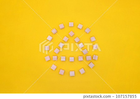 Wood cube icon with a circle in a triangle on a yellow background 107157855