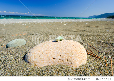 raw jade stone on the coast raw jade stone on the coast 107158645