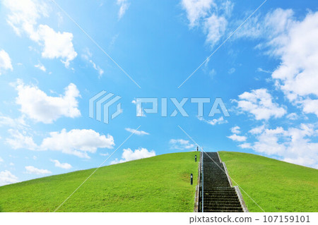 Refreshing summer blue sky and park hill Refreshing summer blue sky and park hill 107159101