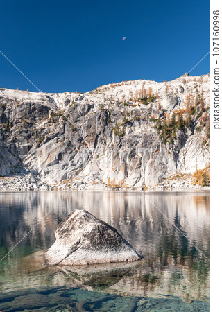 Granite cliffs of Prusik Peak and Lake Viviane Granite cliffs of Prusik Peak and Lake Viviane 107160998