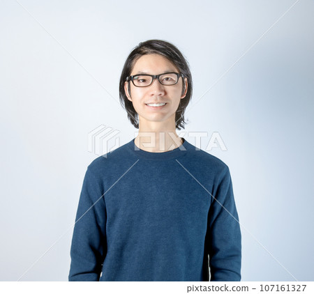 Smiling man wearing glasses, casual clothes Smiling man wearing glasses, casual clothes 107161327