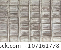 Old wooden facade 107161778