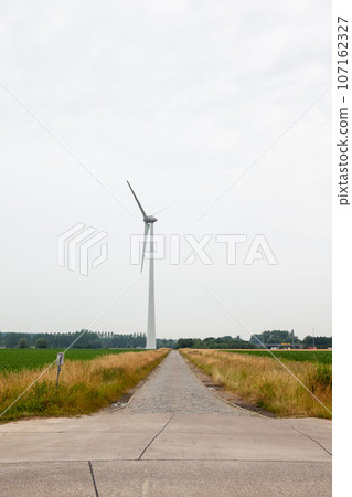 Windmill on a farm Windmill on a farm 107162327