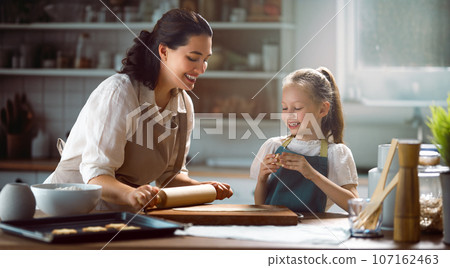 family are preparing bakery together family are preparing bakery together 107162463