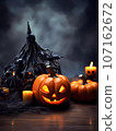 Halloween decorations background. Pumpkins on a dark background. Holiday Halloween 107162672