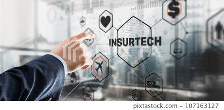Insurtech button on virtual screen. New 2023 year 107163127