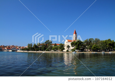 Croatia's World Heritage Site, Trogir, Adriatic Island, St. Lovro Cathedral with its bell tower seen across the sea Croatia's World Heritage Site, Trogir, Adriatic Island, St. Lovro Cathedral with its bell tower seen across the sea 107164012
