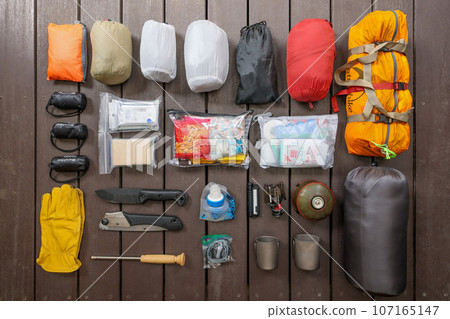 I lined up my camping supplies while preparing to pack them up. I lined up my camping supplies while preparing to pack them up. 107165147