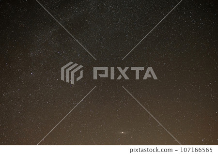 Night sky with stars - Perseids. Background for space exploration and night photography. 107166565
