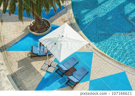Poolside at a resort hotel with poolside Poolside at a resort hotel with poolside 107166621