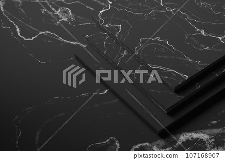 Simple black and white marble background with light streaming in. 107168907