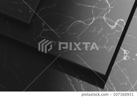 Simple black and white marble background with light streaming in. Simple black and white marble background with light streaming in. 107168931