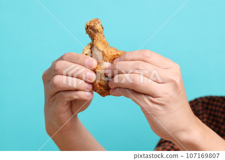 Hand Holding Food 107169807