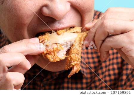 Man Eating Food Man Eating Food 107169891