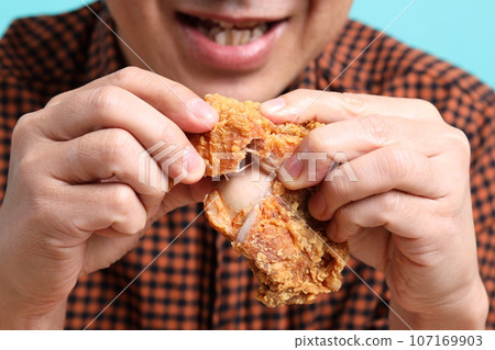 Man Eating Food Man Eating Food 107169903